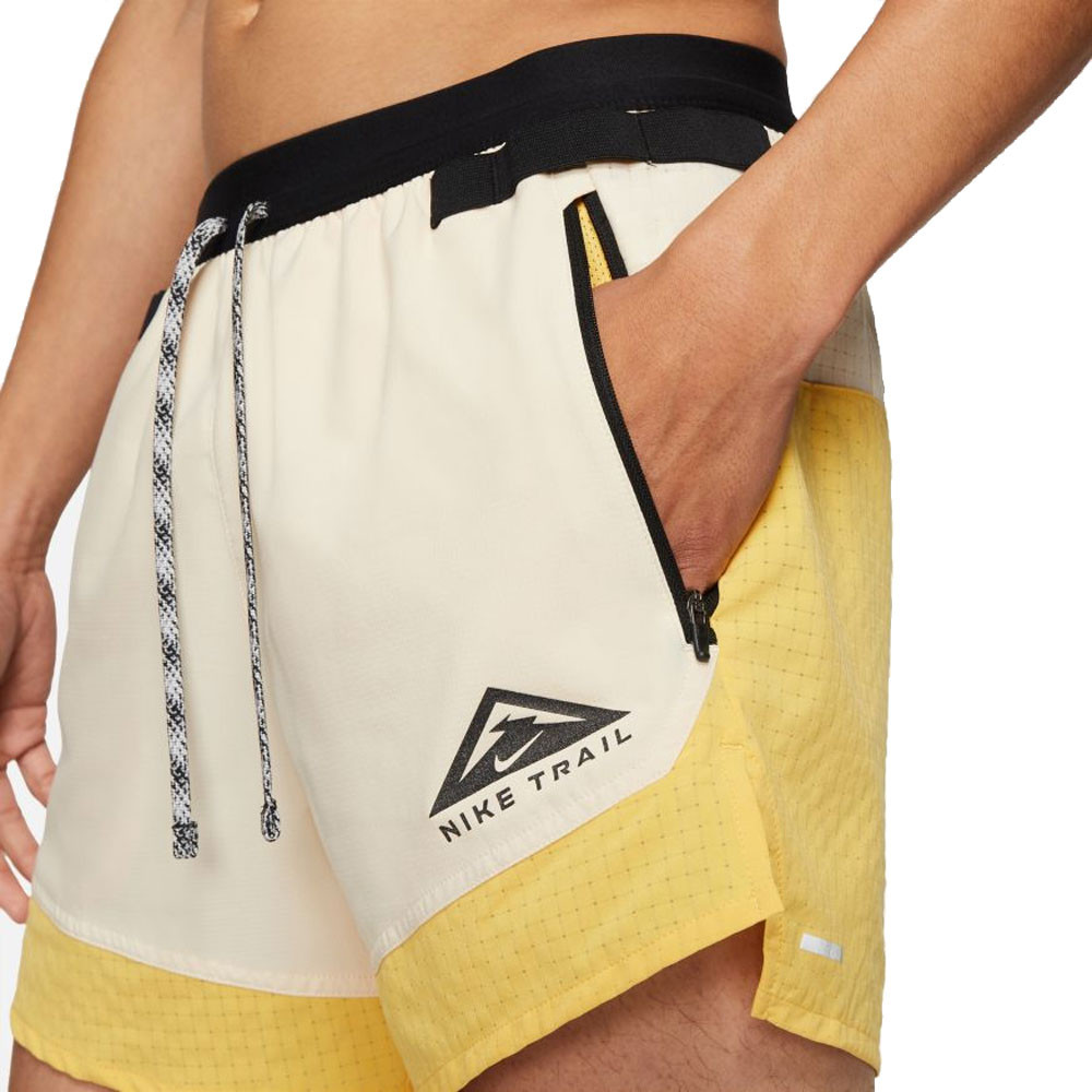 nike trail shorts yellow